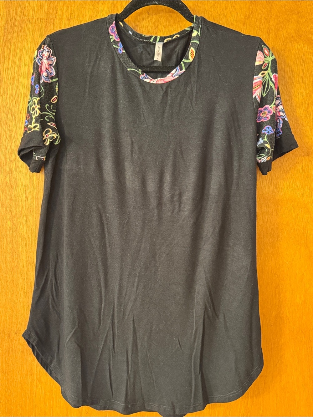 Acting Pro Black Tee with Multicolor Floral Trim